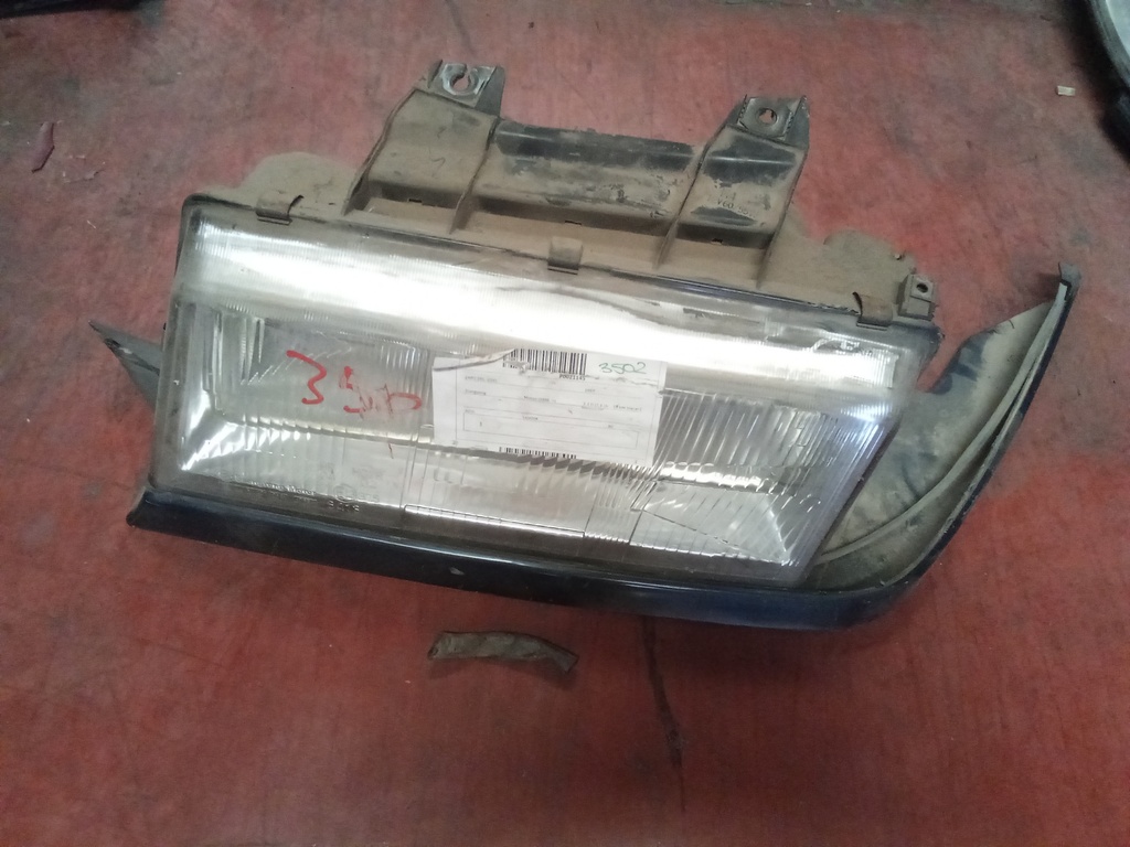 Faro izquierdo ssangyong musso '97