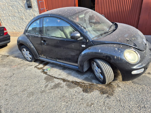 0393 VOLKSWAGEN NEW BETTLE 2.0 GASOLINA 2003