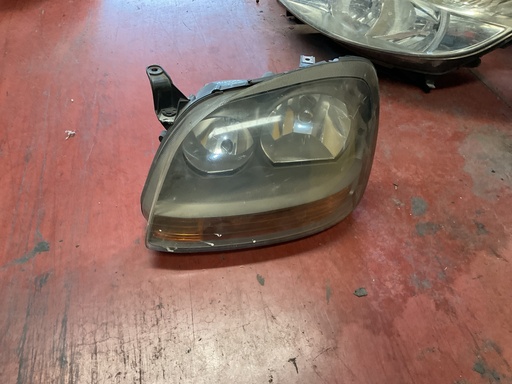 Faro izquierdo Nissan Almera Tino