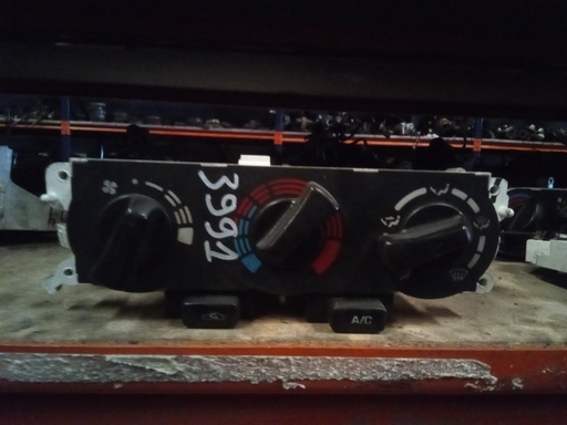 Mando aire acondicionado Nissan primera '97